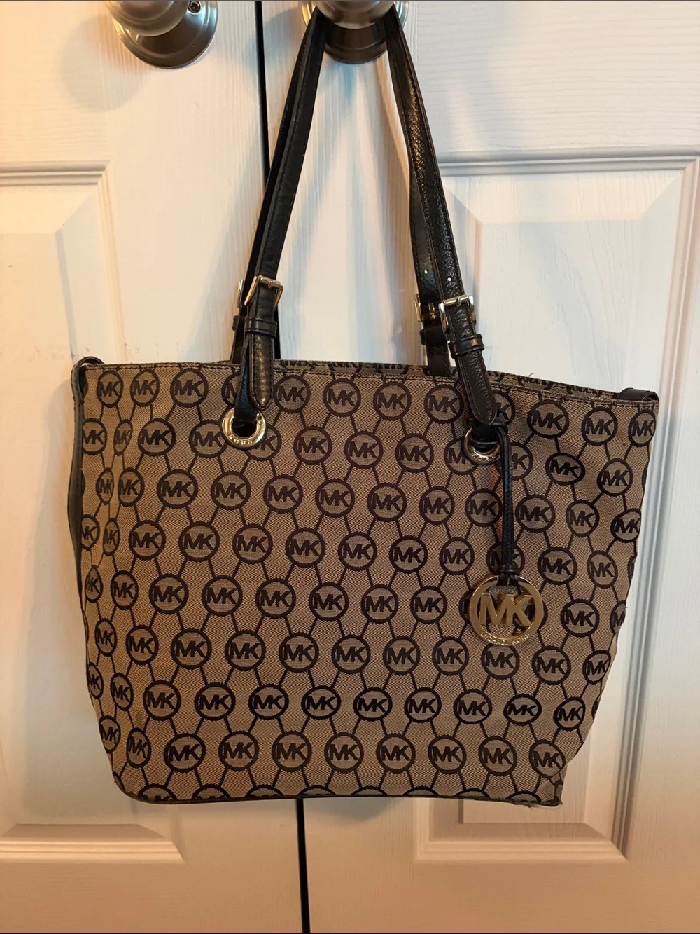 Michael Kors Brown Monogram Tote with Black Straps and Gold Charm